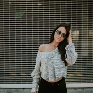Woman with Sunglasses and Imbalanced Posture