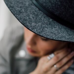 Fashionable Woman with Hat, Face out of Focus